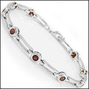 Woman's White Gold & Red Garnet Bracelet